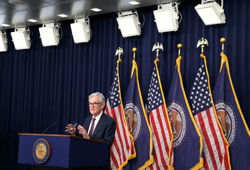 Fed cuts rates 25 bp, scales back 2025 easing projections